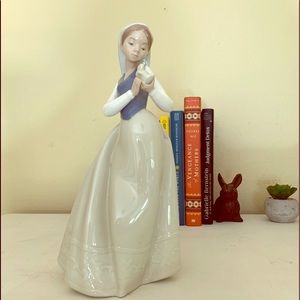Lladro “girl with feathered friend” #1264
